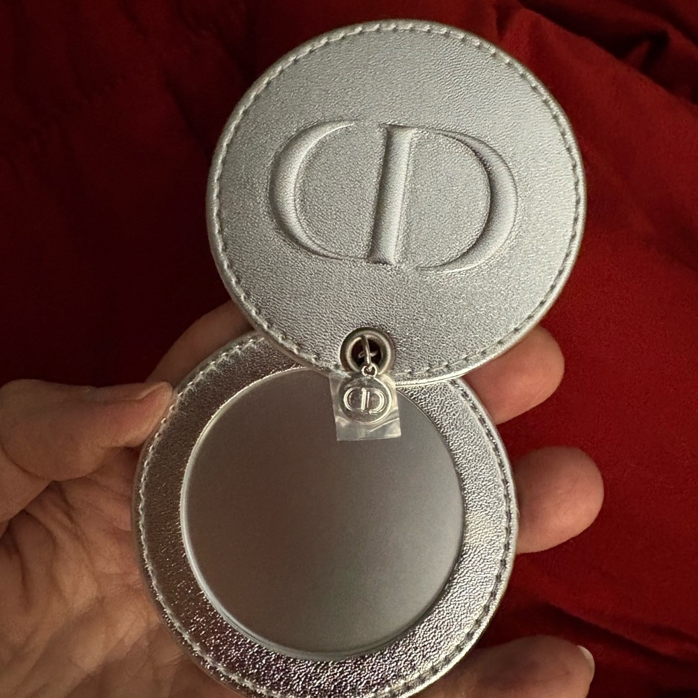 Dior VIP Shimmering Silver Compact mirror.